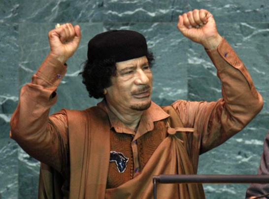 qaddafi-hands-up